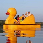 people on paddle boat