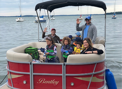group on pontoon boat